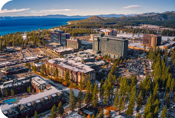 South Lake Tahoe aerial view of casino buildings and Lake Tahoe in the background